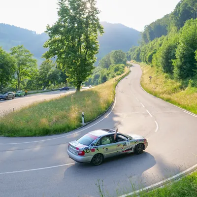 Rally car in a hairpin bend
